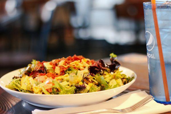 Build Your Own Salad (Mixed Greens, Cucumber, Corn, Tomato, Avocado, Bacon Crumbles, Smoked Gouda, Honey Mustard)