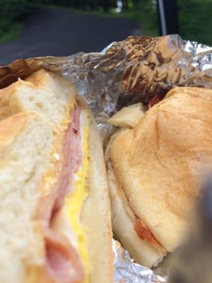 A steinmann deli Virginia ham egg and cheese on a roll.