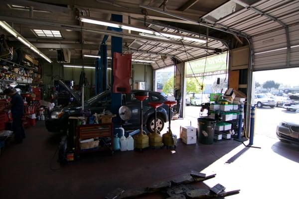 4 bay shop specializing in German and Japanese vehicles. 2 year 24k warranty on parts and labor.