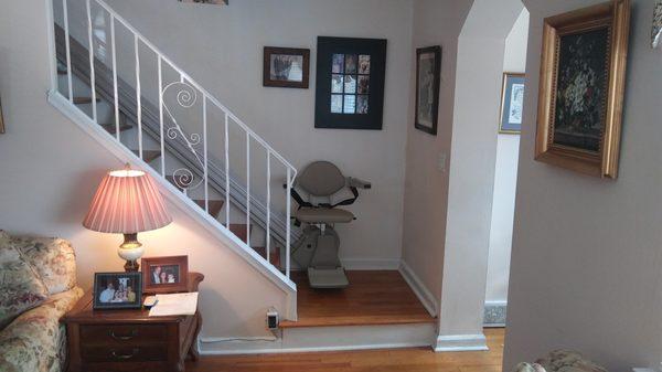 Straight stairlift in riding position.