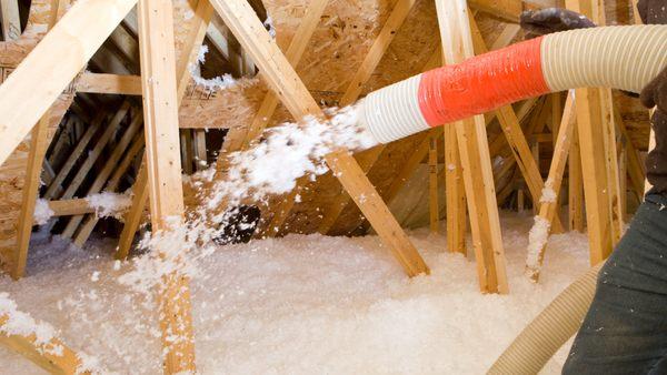 Blown in fiberglass insulation installed in the attic.