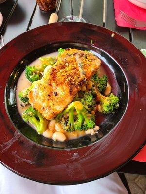 Salmon oreganato over broccoli and white beans.