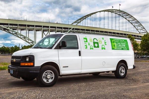 Our company van parked by Fremont Bridge.