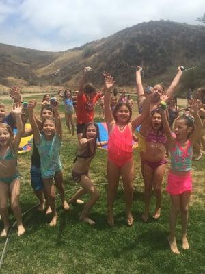 Time to jump for joy... it's SLIP 'N SLIDE day at Art Camp!