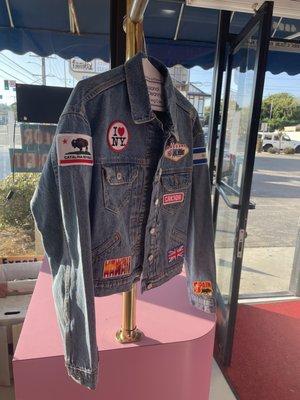 Denim jacket with patches sewn on by Ali at Corner Cleaners :)