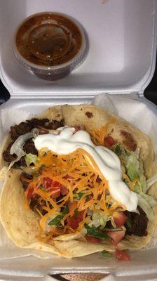 Steak taco supreme on flour tortilla