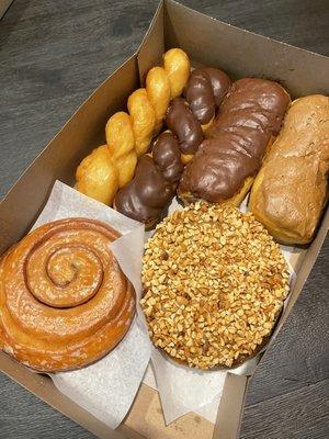 Glazed twist, chocolate twist, chocolate bar, maple bar, Persian, maple/nut Persian, Apple fritters (under the Persian)