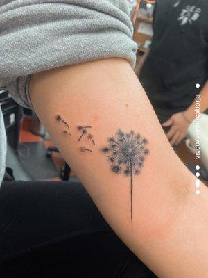 Dandilion on the lower bicep.