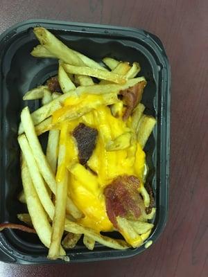 Baconator fries. Over cooked fries and 4 pieces of bacon