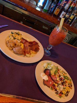 Delmonico steak, Caesar salad,couscous salad.Fluffy scrambled eggs, bacon, sausage, french toast  and a hot pasta, spinach and cheese bake