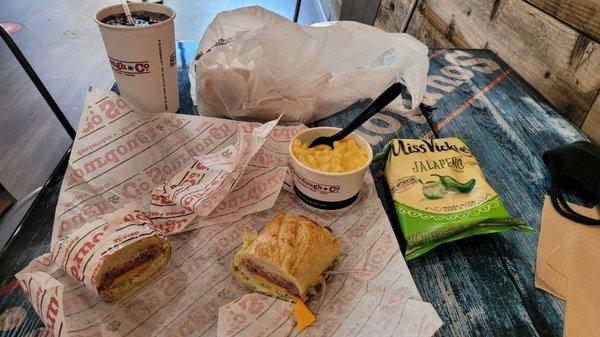 Sandwich, soda, mac and cheese and chips