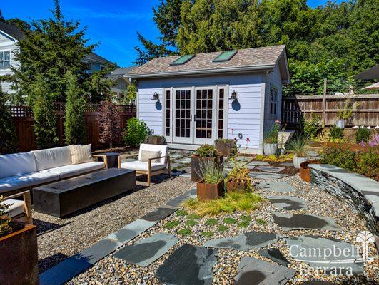 Pea Gravel Patio with Steppers, Ground Cover, and Planters