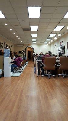 Lots of technicians and lots of specialized chairs for pedicures.