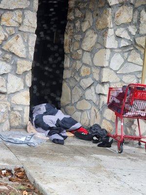 Homeless camper blocking the door