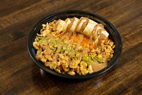 Sweet Potato Bowl  ​ Whipped Sweet Potato Base Almond Butter, Banana, Walnuts Pumpkin Seeds, Granola, Cinnamon