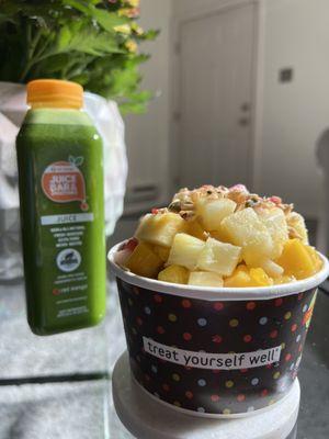 Pink bowl  Dragonfruit w granola and bananas and blueberries  with pineapple mango and strawberry added