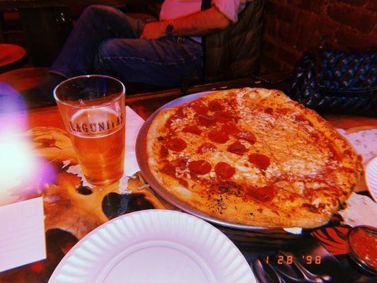 Beer and a Large Pie Cheese half Pepperoni! Really good cheesy pizza