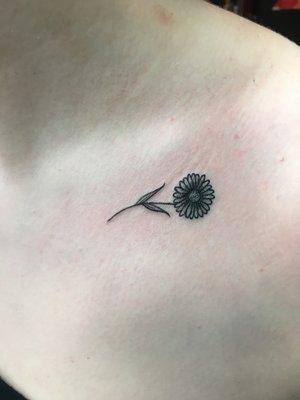 Simple sunflower tattoo, done by Mono