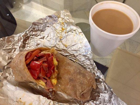 Breakfast burrito with eggs, pork roll, provolone cheese, grilled peppers, & onions + a small coffee ($6)