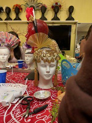 We have lots of working space and all kinds of materials for our headdress workshop.