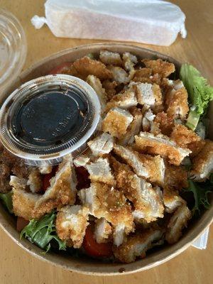 The Betsy salad: Chicken cutlet, mixed greens, red onions, hot cherry peppers, roasted corn, gorgonzola, and tomatoes with balsamic dressing