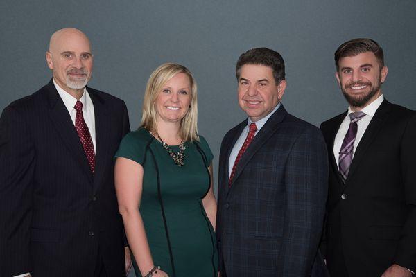 Property and Casualty Team (Ross Wood and Matthew Skolnick) and Partners (Sara Howland and Myron Jucha)