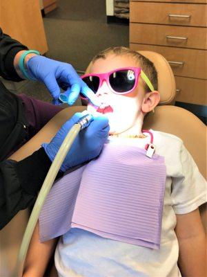 Kids love getting clean teeth!