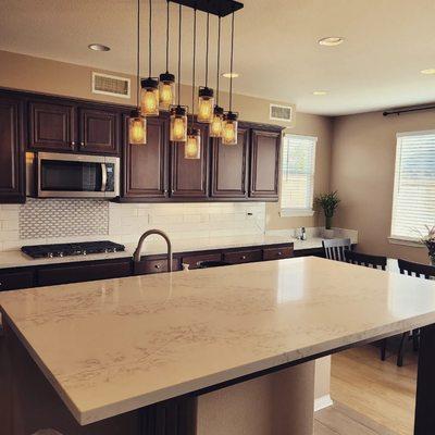 Calacatta Alaska quartz countertops and subway tile backsplash