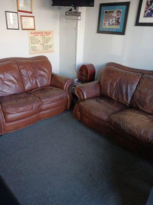 Inside comfy couch wait area