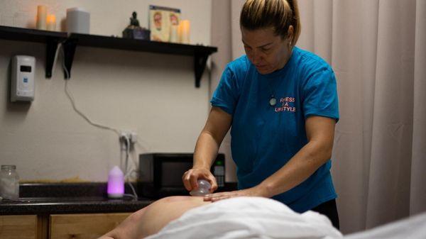 Therapeutic massage combined with cupping enhance circulation, relieve pain, and extract toxins from the body.