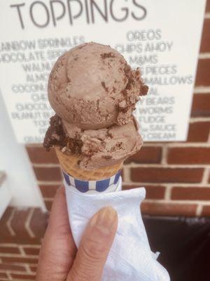 "Snack" size chocolate fudge brownie on a sugar cone