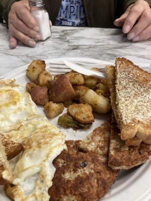 This is my honey's eggs and grilled sausage patties with homemade fries and toast