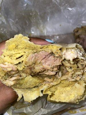 Undercooked chicken in a chicken roti