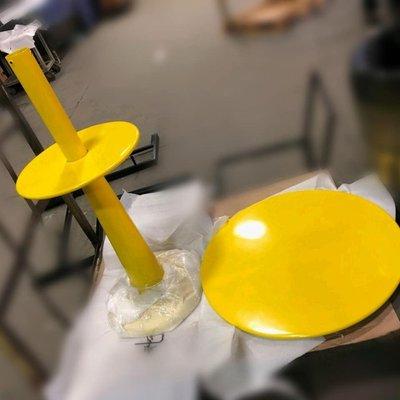 Powder coated yellow table base.