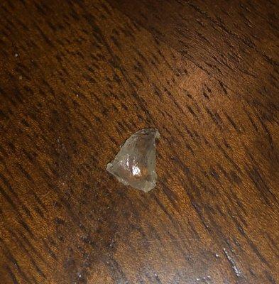 A piece of broken glass found in the calzone.