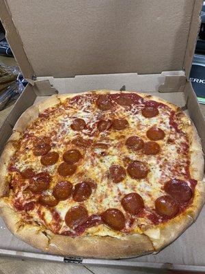 Large pepperoni pizza. The topping was very uneven...