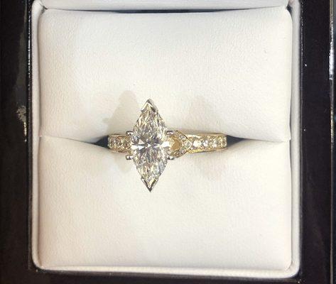 Custom made ring with this beautiful marquise center stone