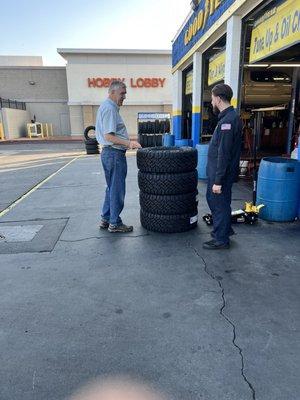 Pat inspecting the tires