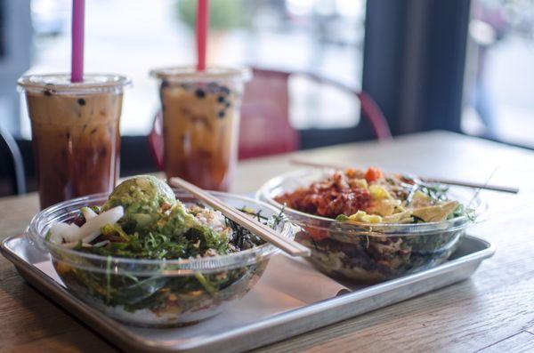 Thai tea and two bowls of Poké.