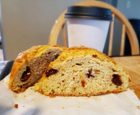 Cross section of the cherry almond scone and 8 oz latte