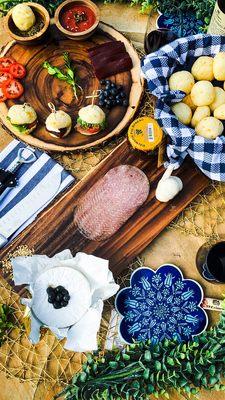 It's not a picnic without pao de queijo ( cheese bread ) miniature sandwiches!