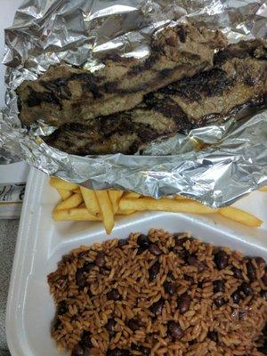 Carne asada with gallopinto and French fries