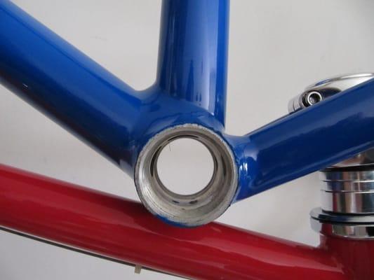 The Blue is Powder Coated.  The Red is Painted.