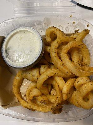 Potato noodles with seasoning. These fries weren't curly, crispy or cooked.