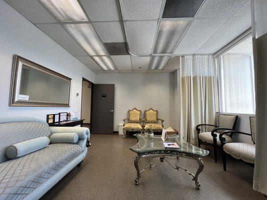 One of many additional waiting areas--with comfortable, elegant seating options and privacy curtains.