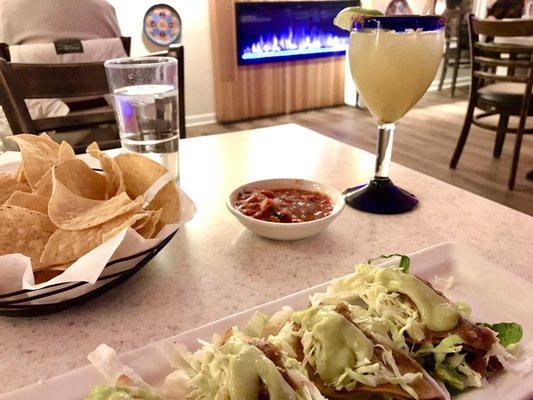 Free chips+salsa, happy hour roasted pineapple margarita ($10), tacos de papa (vegan without crema, gluten free, $7.5 for 4.)