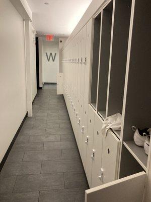 Locker hallway (restrooms on either side)