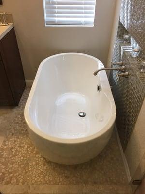 Tub fitted and lined up by RWB Plumning