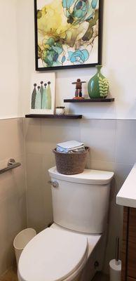 Toilet area with grab bar