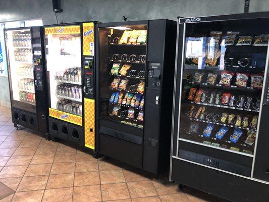 Vending machines for drinks and snacks.